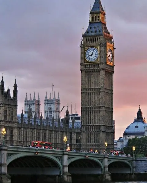 Elizabeth Tower and Westminster Bridge in London at dusk